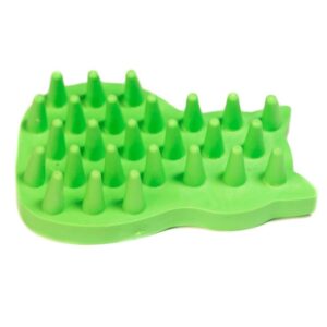 A green rubber brush