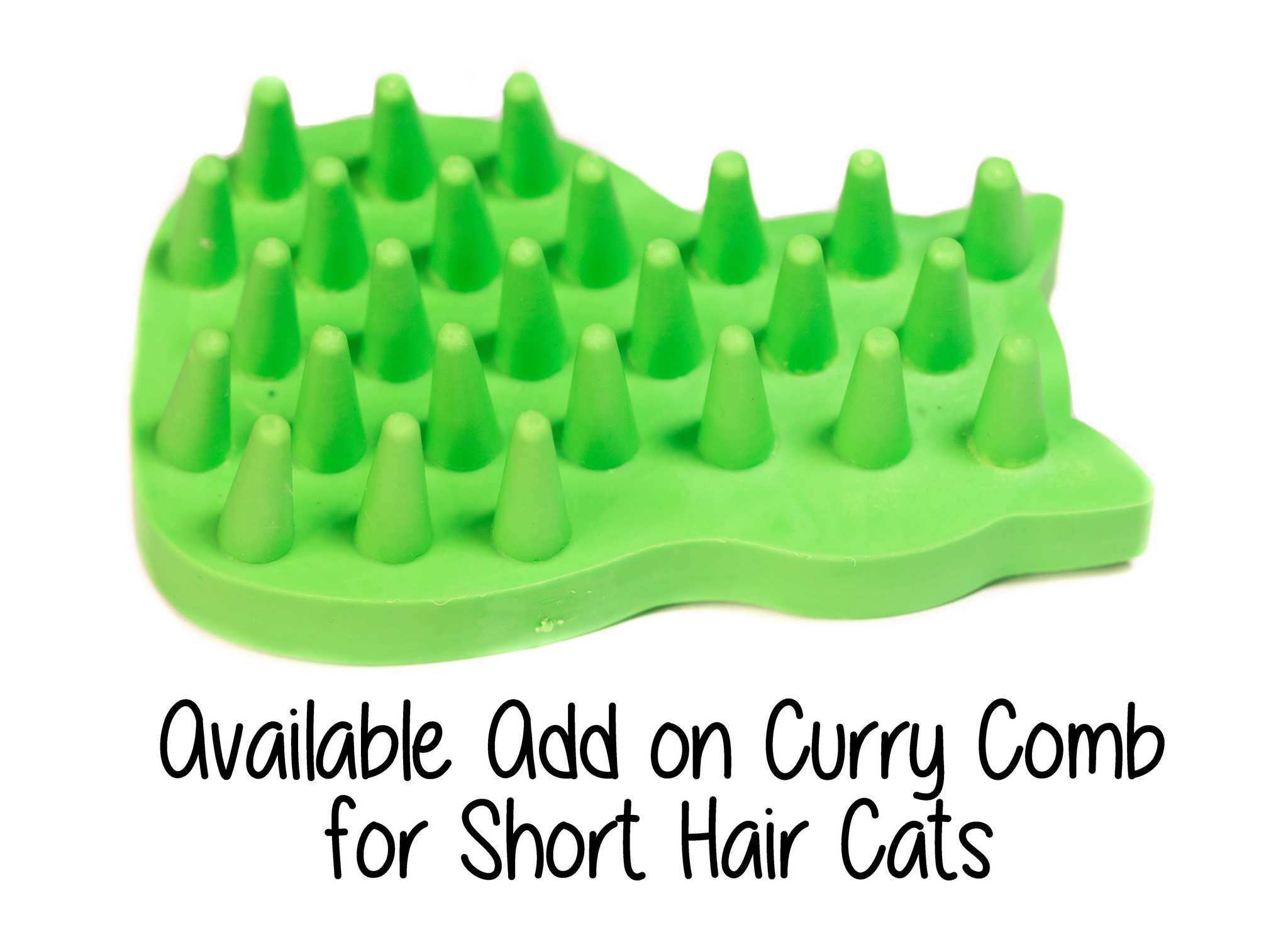 A green rubber brush for short hair cats