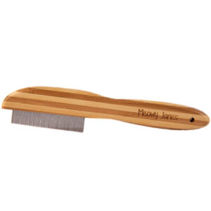 a flea comb with a bamboo handle