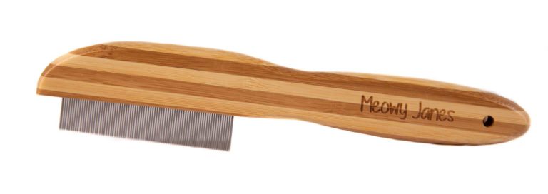 A flea comb with a bamboo handle