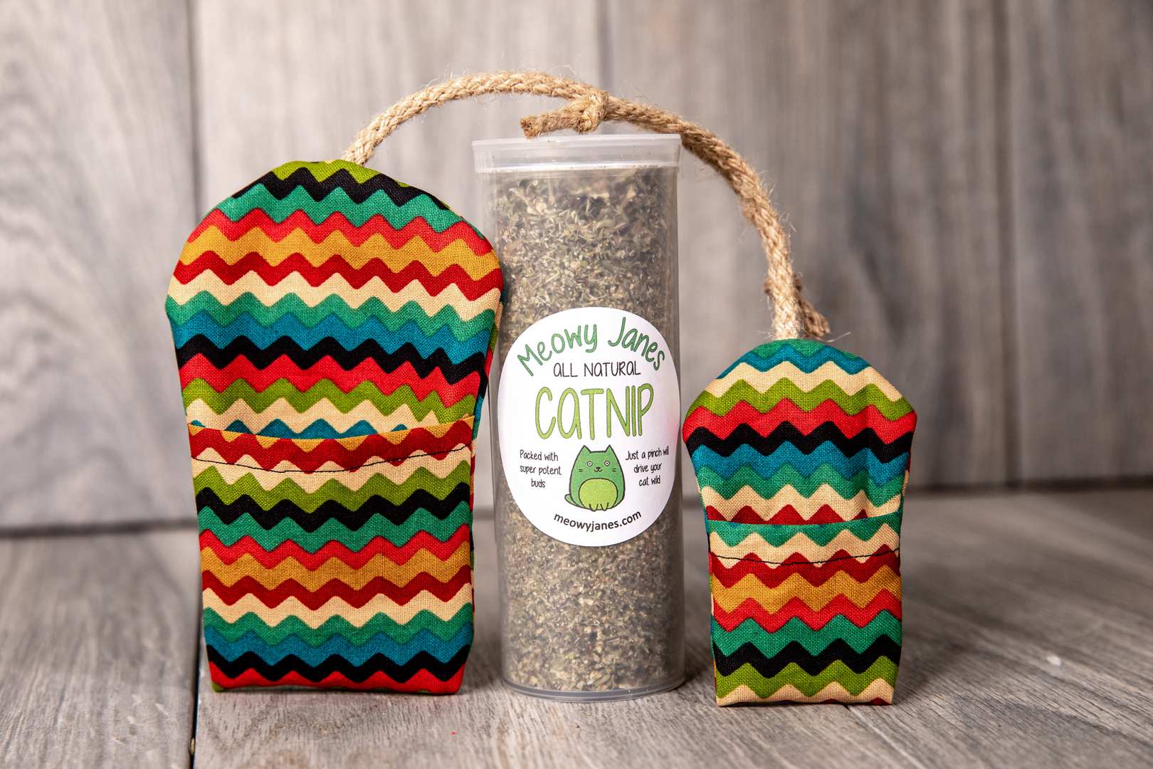 A fabric refillable toy that looks like a mouse and tube of catnip