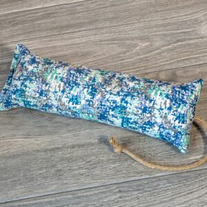 A catnip kicker made from a blue splattered paint themed fabric