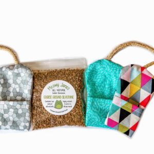 3 Refillable mouse toys in different colors around a bag of silvervine. 