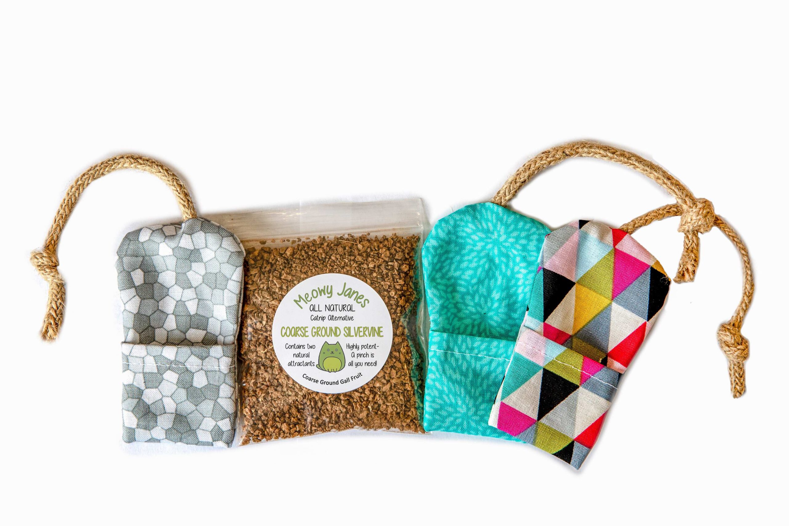 3 Refillable mouse toys in different colors around a bag of silvervine.