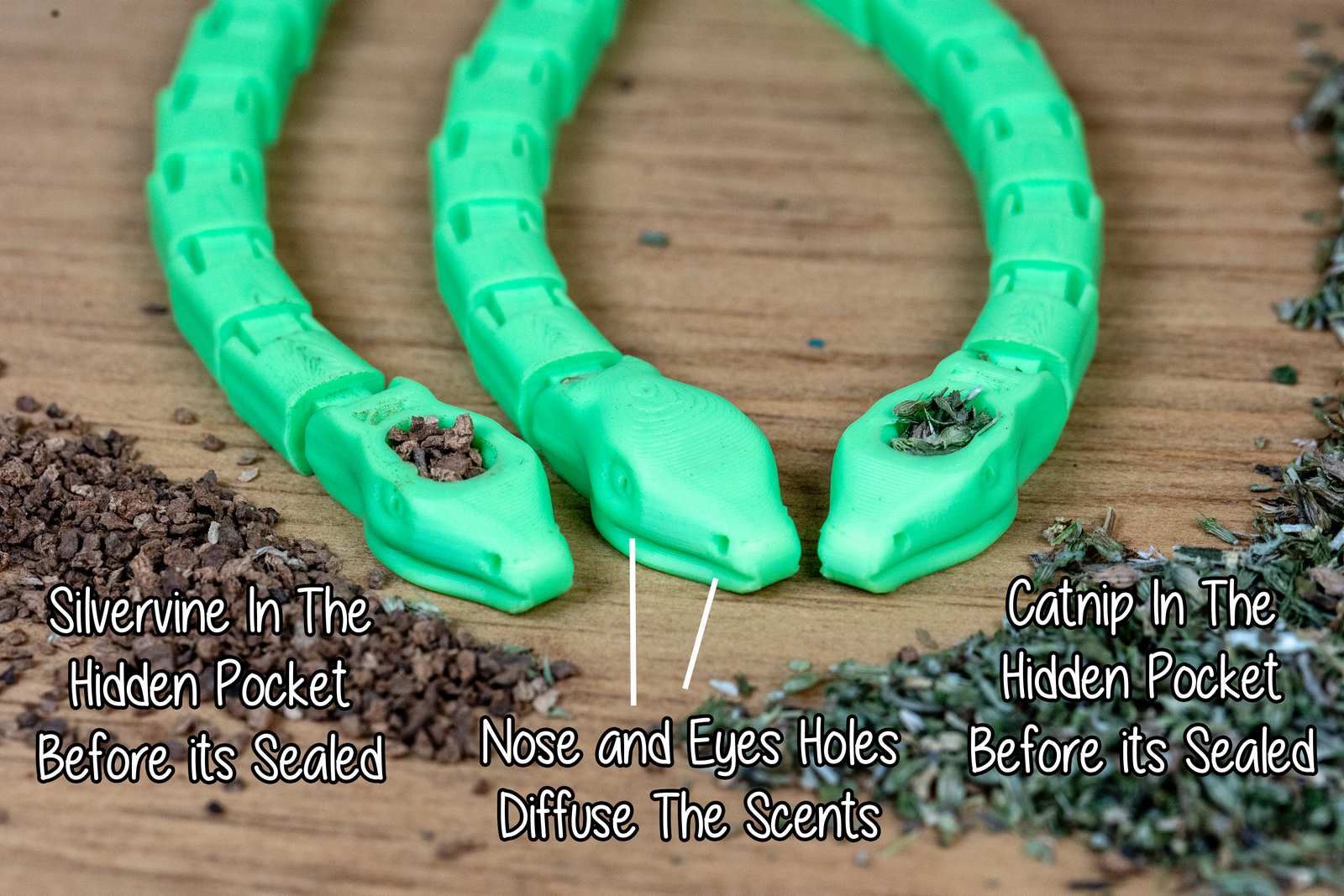Green articulated snake toys showing catnip and silvervine inside of the heads. Text points out holes in the heads that allow scent to escape