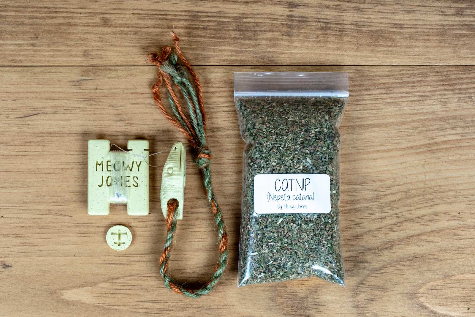 A 3D printed Snake toy for cats with various accessories.