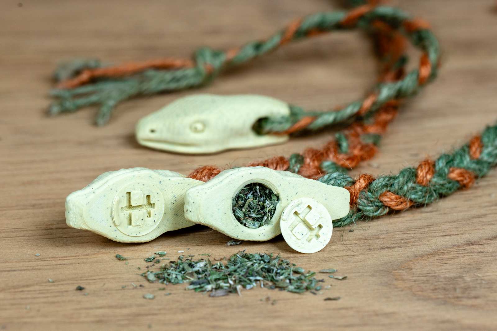 A 3D printed Snake toy for cats both open and closed