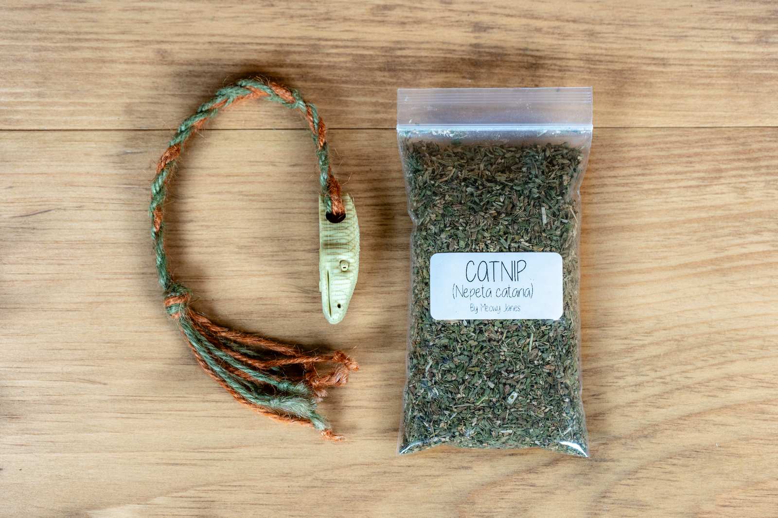 A 3D printed Snake toy for cats with various accessories.