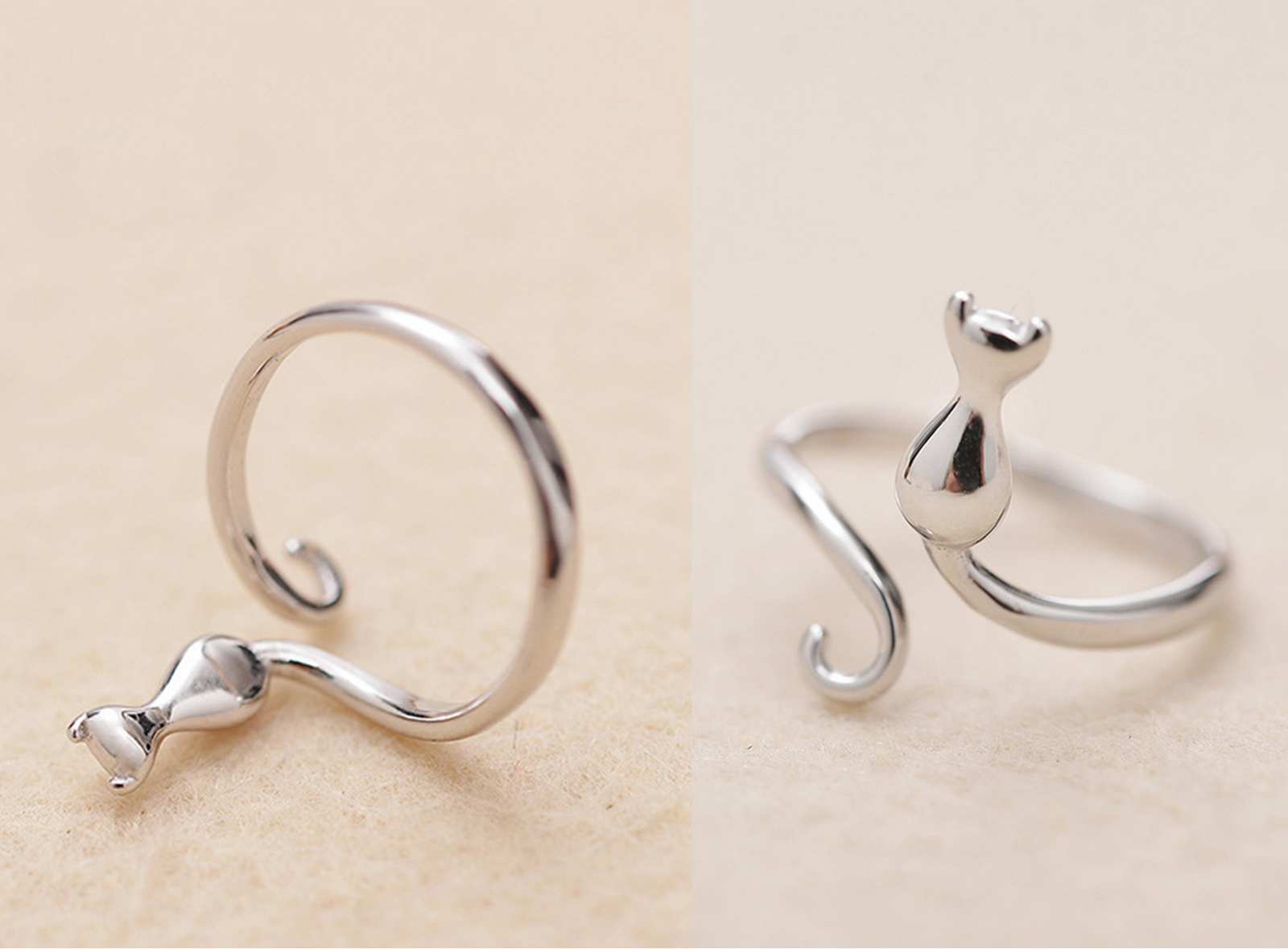 Two metal rings that look like cats