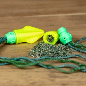 A cat toy that looks like a small squid with yellow body, green head, and jute tentacles. Head is removed from the body to show the catnip inside