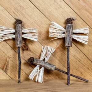 Matatabi sticks, a silvervine fruit, and plant material combined to looked like a dragon fly